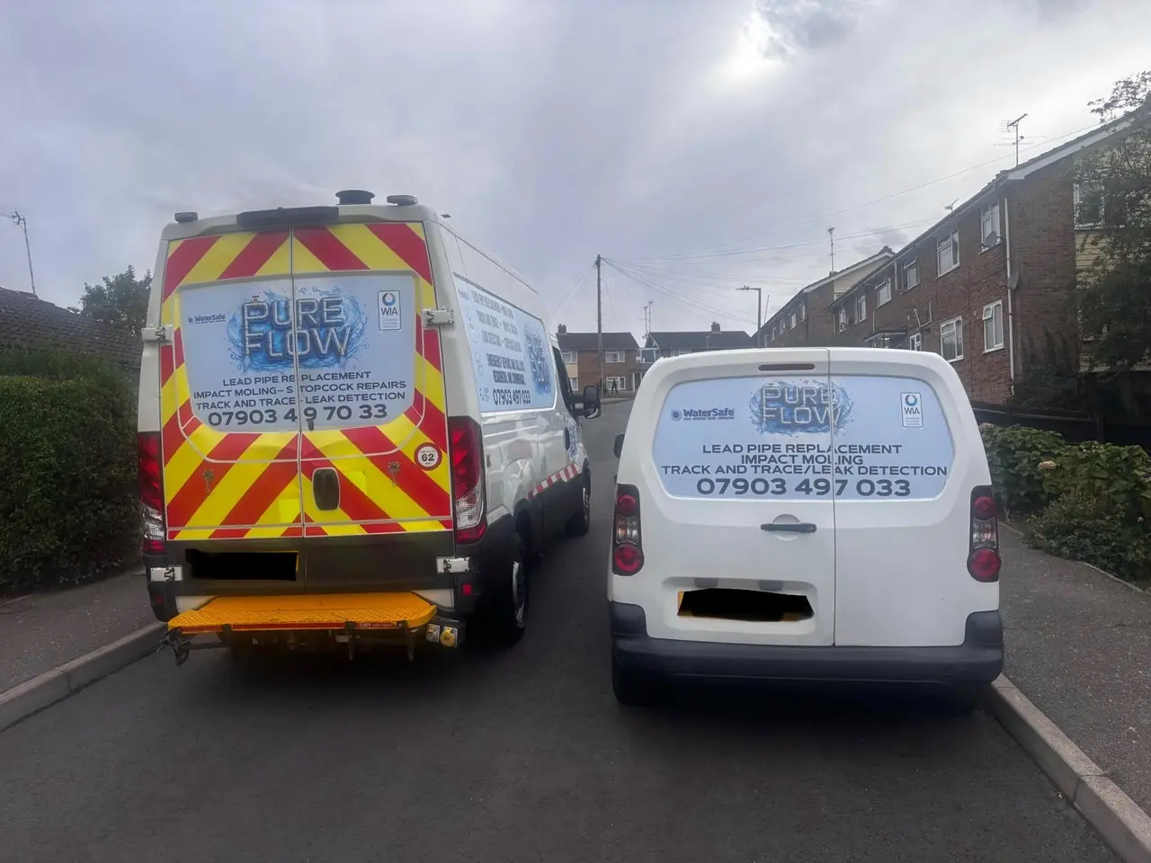 Two PureFlow service vehicles travelling to a project