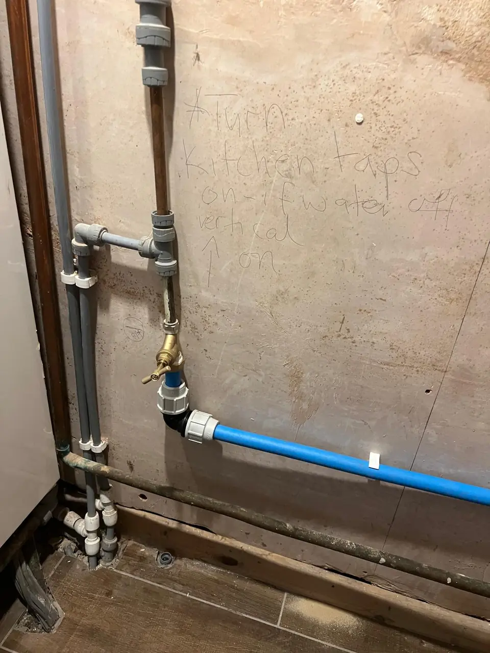 New blue water pipe connected to an internal stopcock