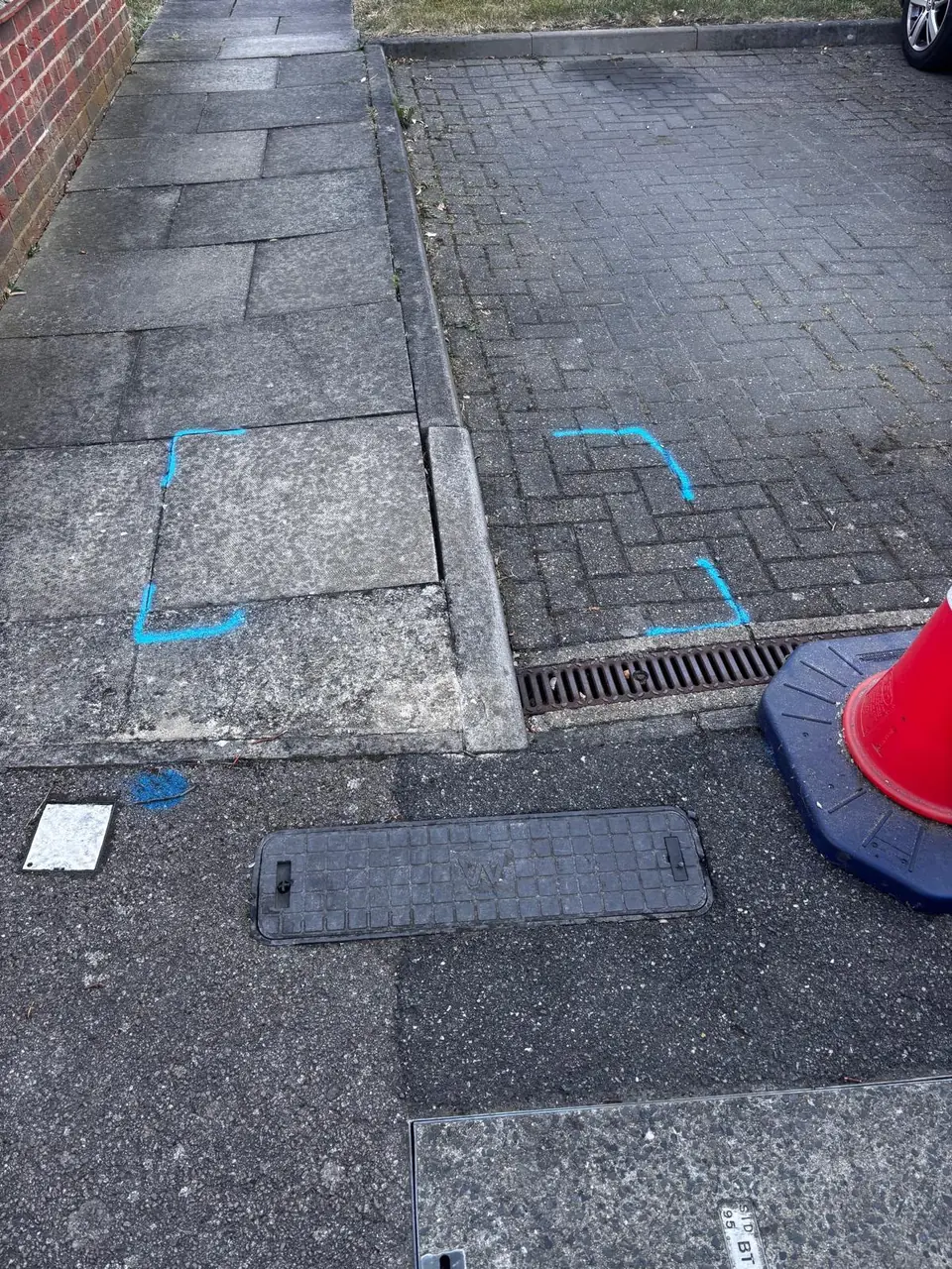Block-paved working area marked before underground pipework begins