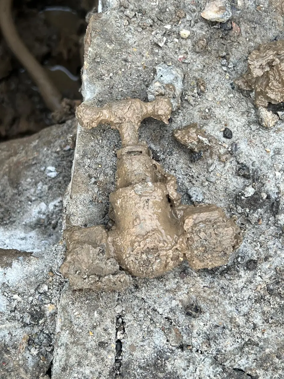 Existing underground stopcock exposed for inspection