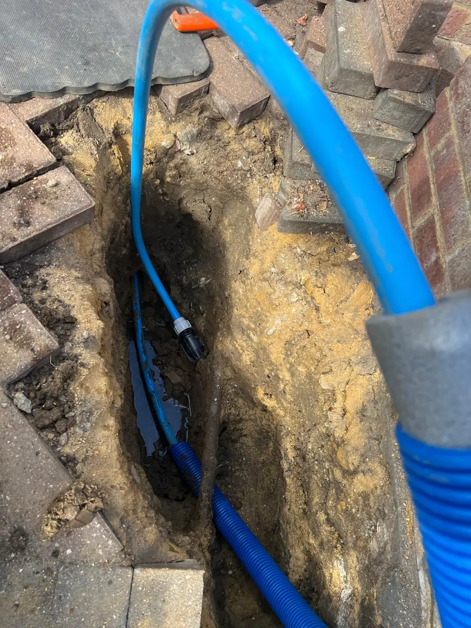 New water service passing through a prepared trench